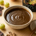 Step 2: Mix with water to make a thin paste.